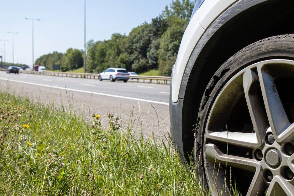 broken down car with slow puncture